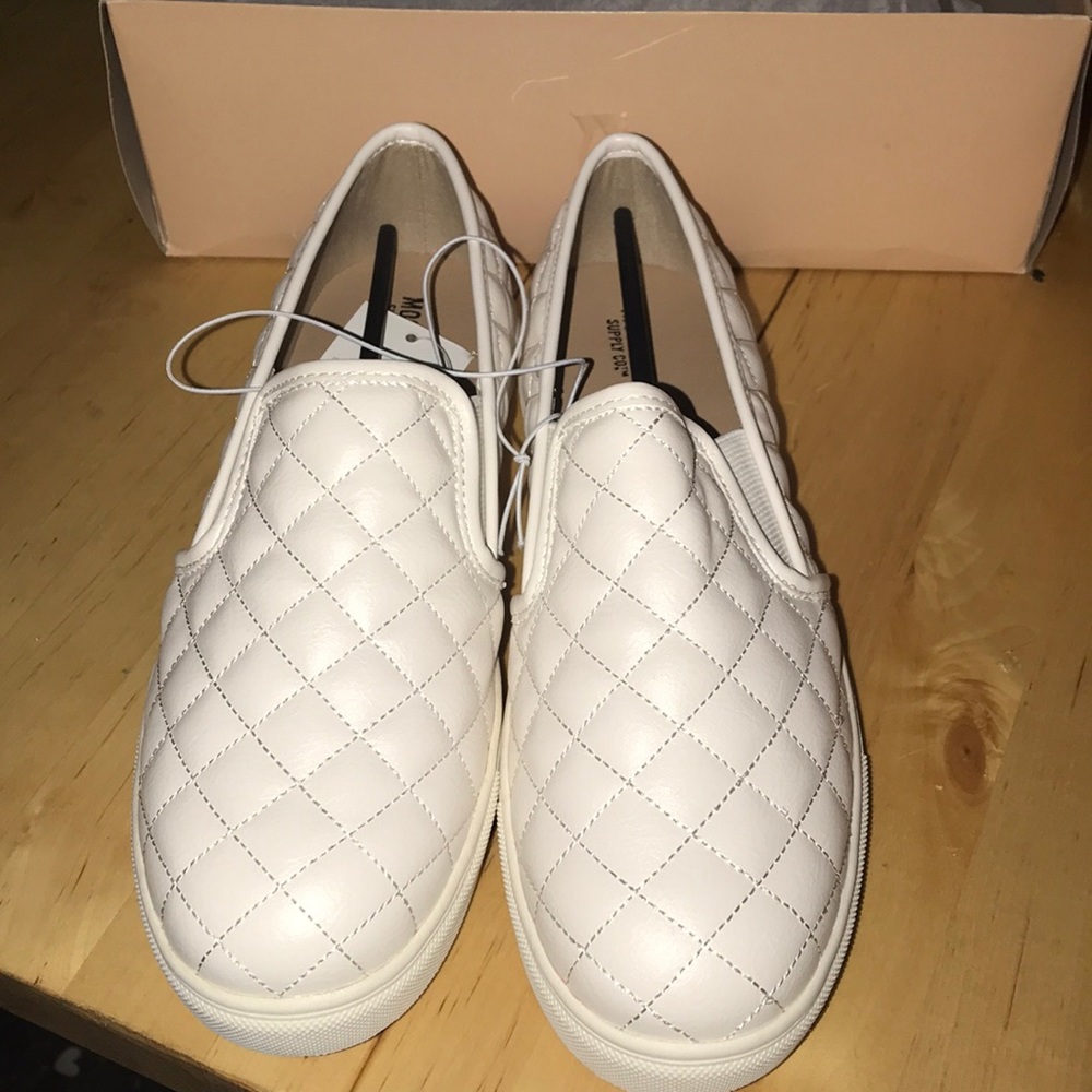 White slip on shoes